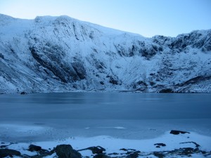 A frozen Llyn Idwal in the morning light