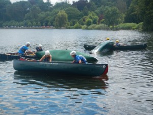 Emptying upturned canoes