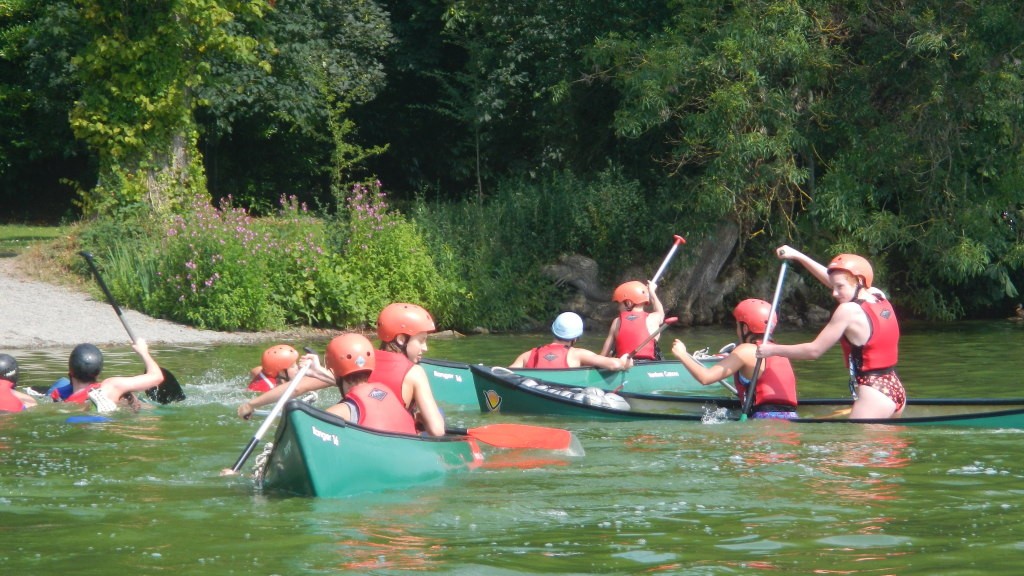 Racing swamped canoes