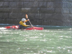 One of the students breaking into the flow under the Menai Bridge