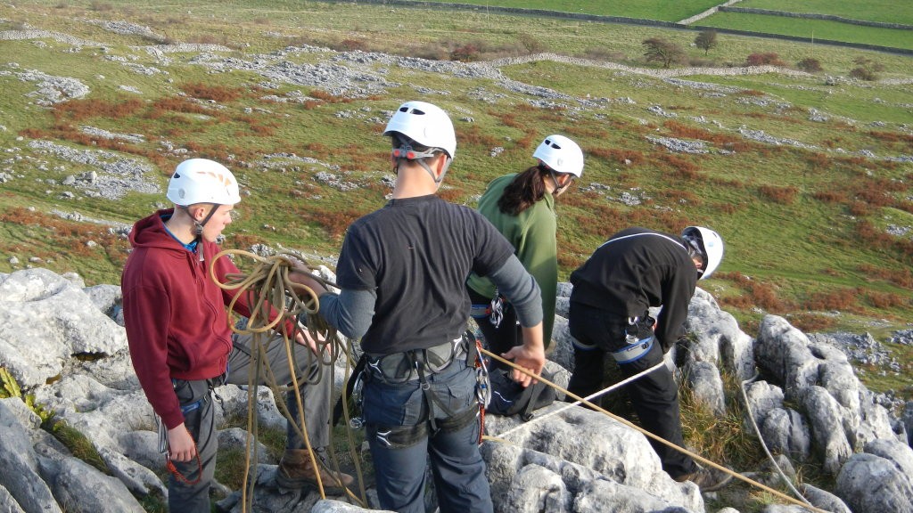 Setting up bottom rope climbs at the top of Twistleton Scar