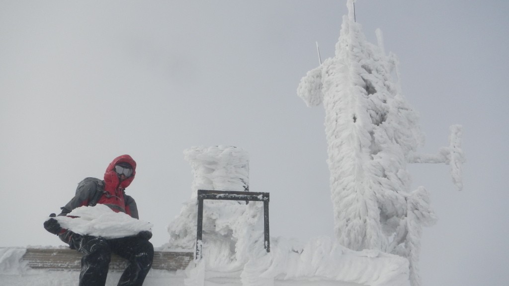 Alfie cleaning off some of the rime from the weather station